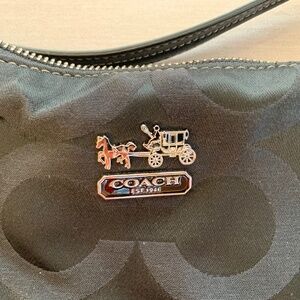 Coach purse- black with purple interior